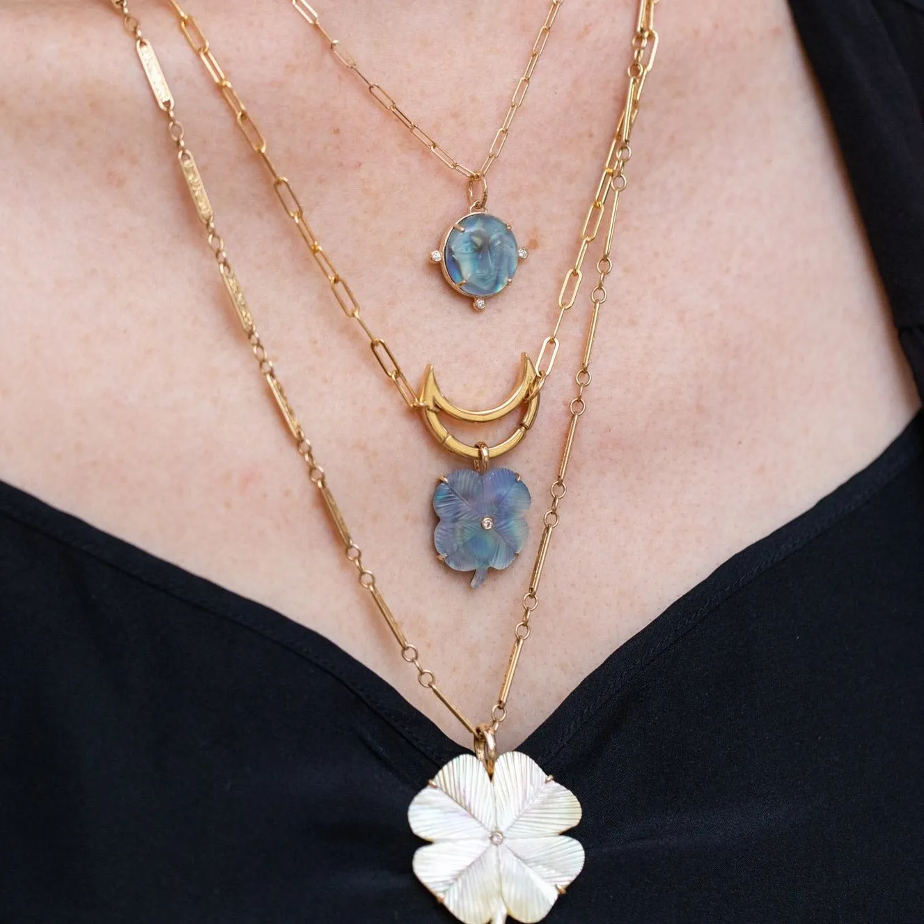 Luminescent Clover Charm