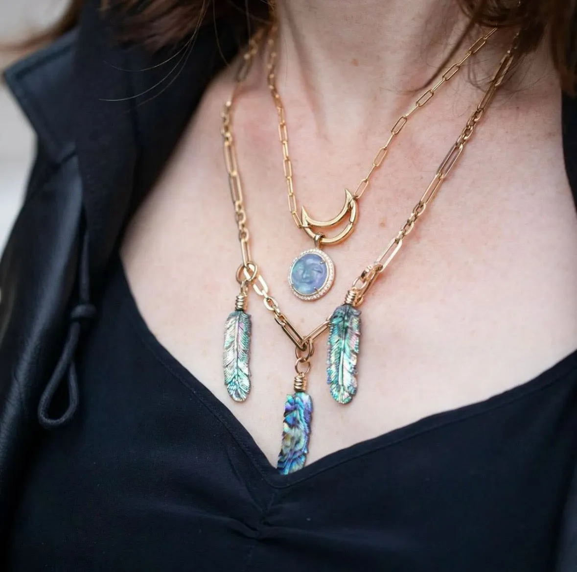 Luminescent Feather Charm