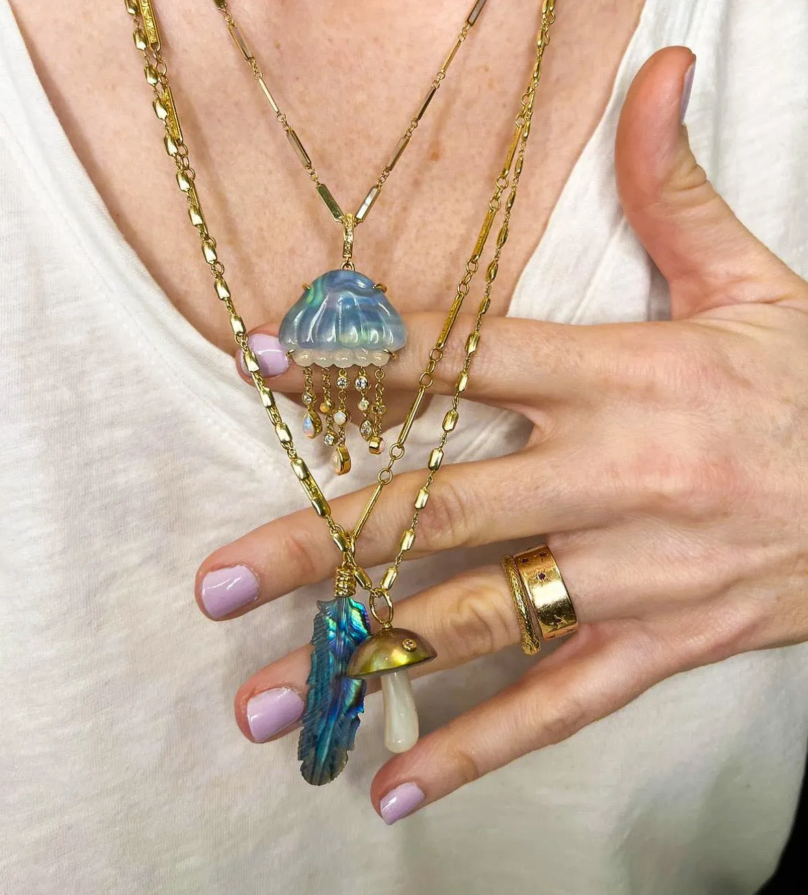 Luminescent Feather Charm